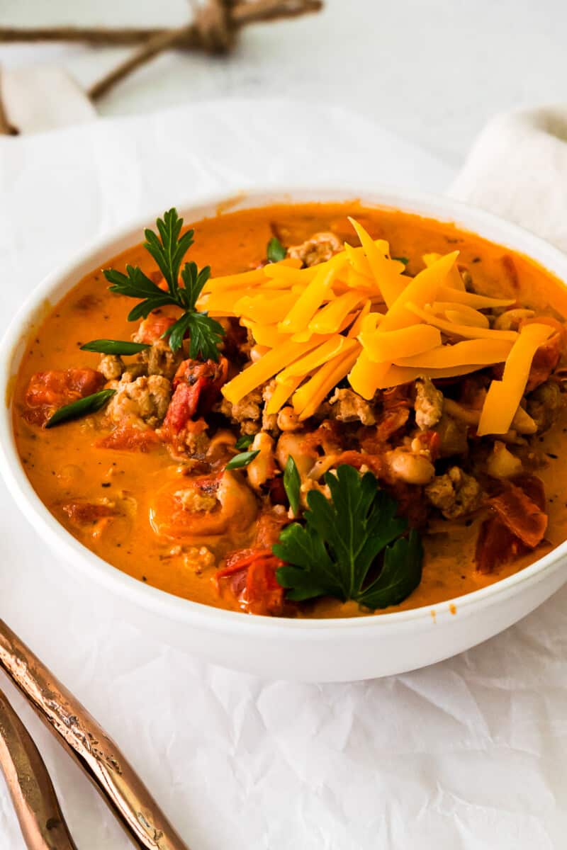 turkey white bean chili in a white bowl