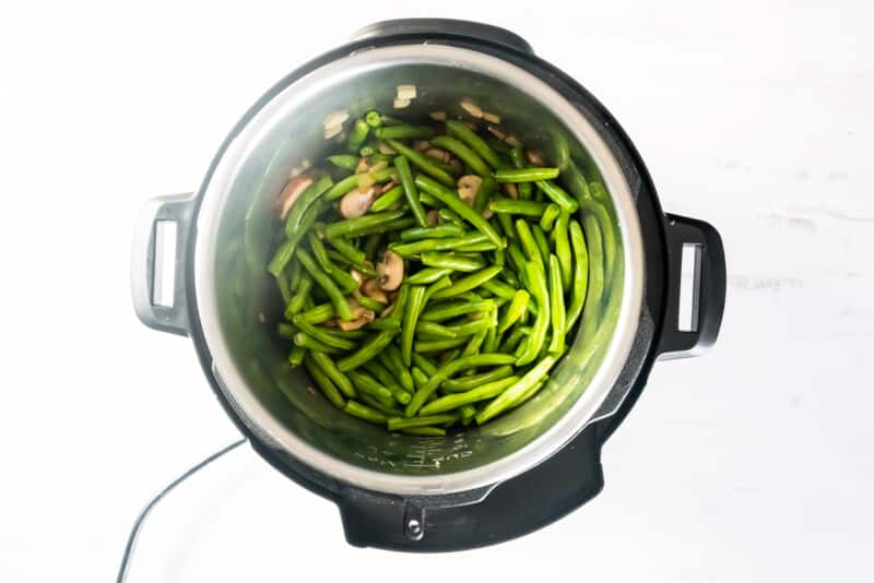 green beans and mushrooms in an instant pot