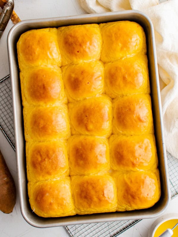 overhead image of sweet potato rolls after baking in a baking dish