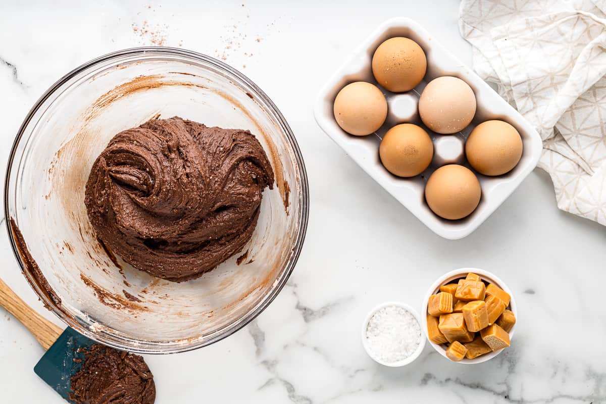 brownie batter cookie dough in a glass bowl.