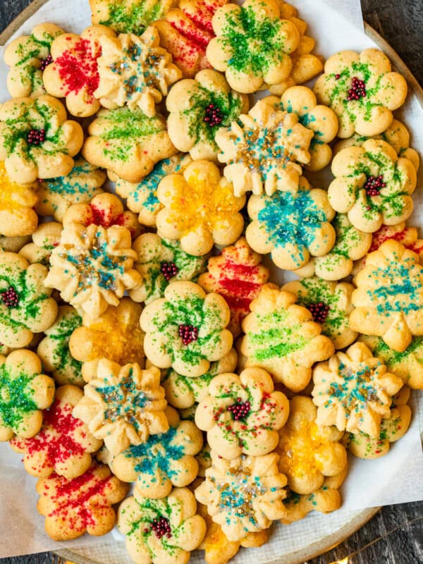 spritz cookies on a white serving platter