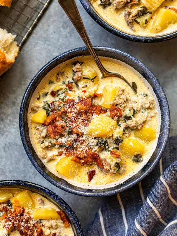 zuppa toscana soup in a bowl with a spoon