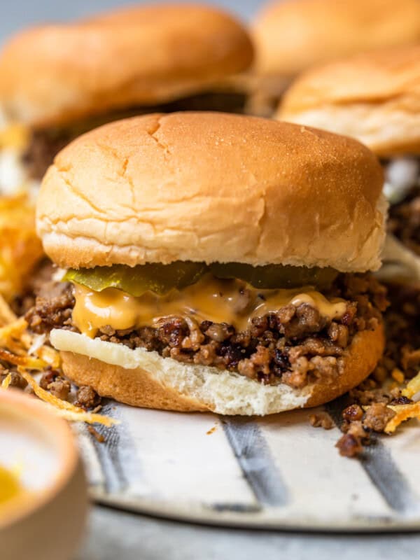 maid rite sandwiches topped with cheese and pickles