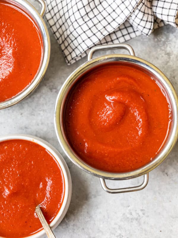 taco sauce in a pot and 2 bowls