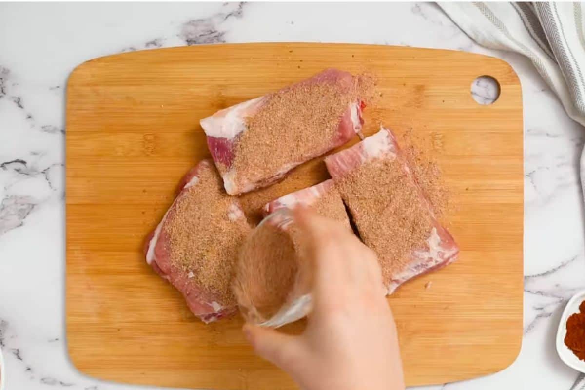 Rub the spice mix all over the ribs nicely.