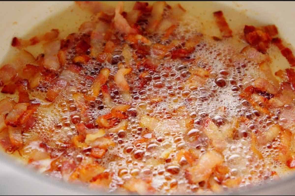 Bacon is browned and crisped. Ready to transfer on a plate.