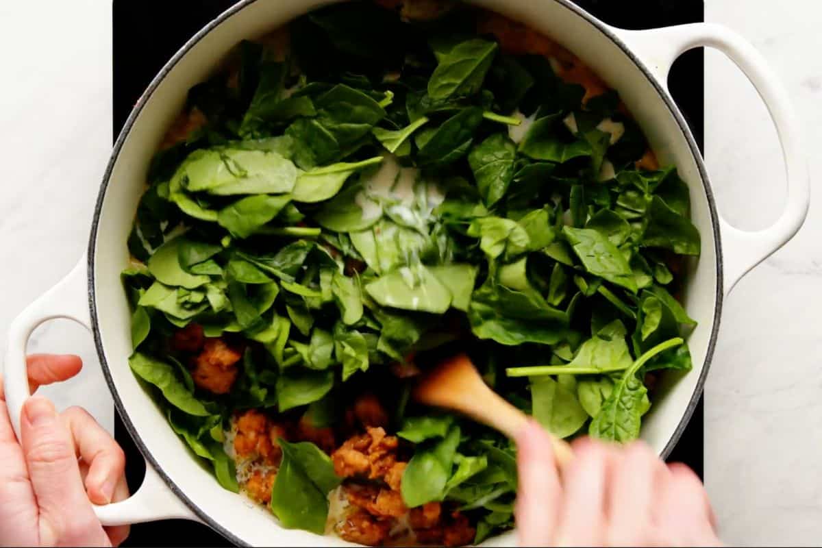 Browned sausage and spinach added.  combine well.