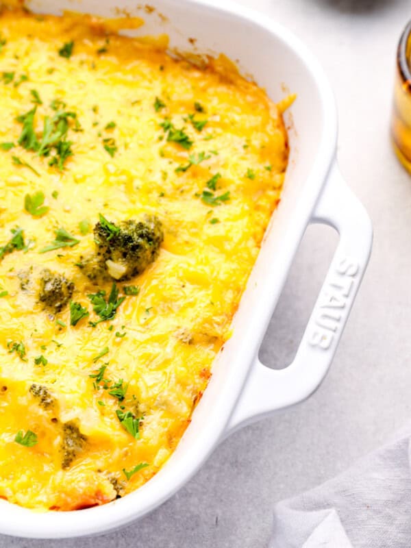 broccoli rice casserole in a white baking dish