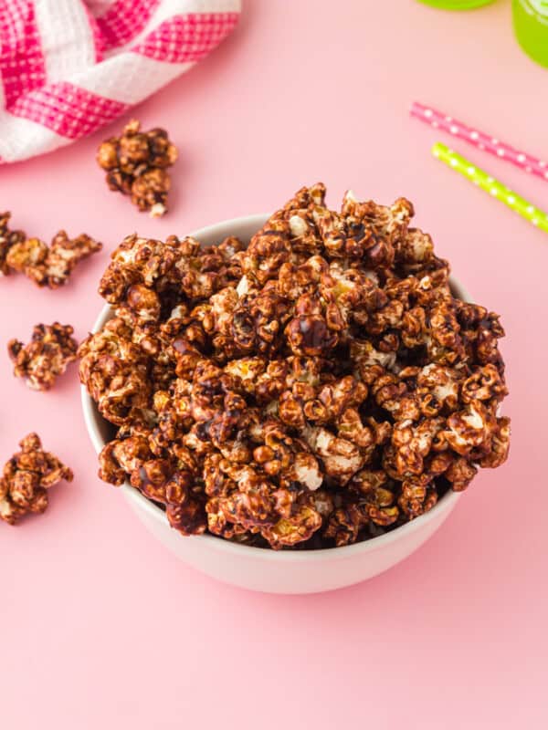 chocolate popcorn in a white bowl