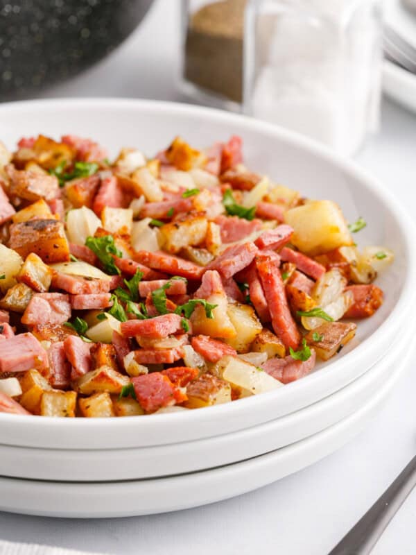 corned beef hash on a white plate