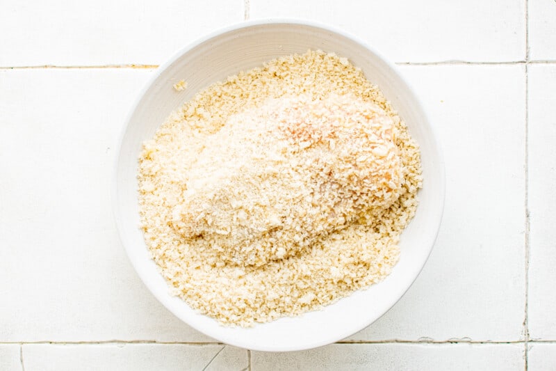 breaded chicken breast coated in bread crumbs