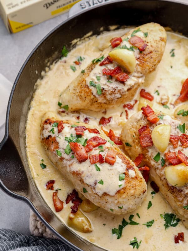 creamy garlic chicken with bacon in a skillet