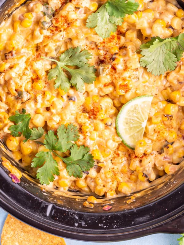 close up of crockpot corn dip in a crockpot.