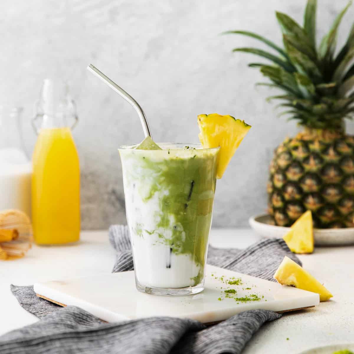 https://www.thecookierookie.com/wp-content/uploads/2022/04/Featured-Pineapple-Matcha-Drink-1.jpg