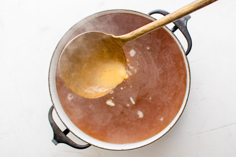 eggs poured into egg drop soup broth.