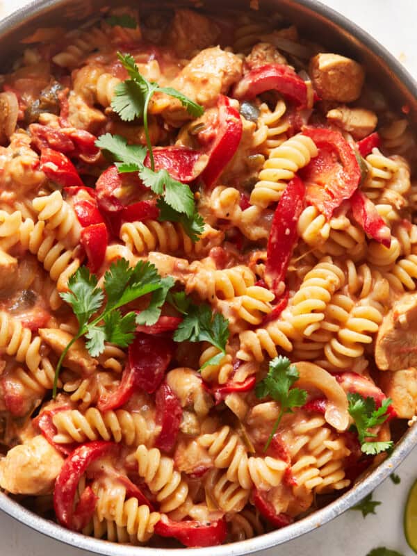 overhead view of chicken fajita pasta in a skillet.