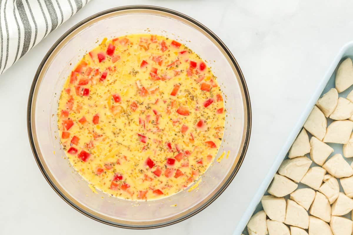 Egg mixture in a glass bowl.