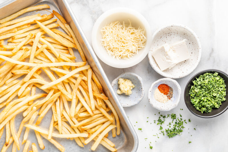 overhead view of ingredients for garlic parmesan fries.