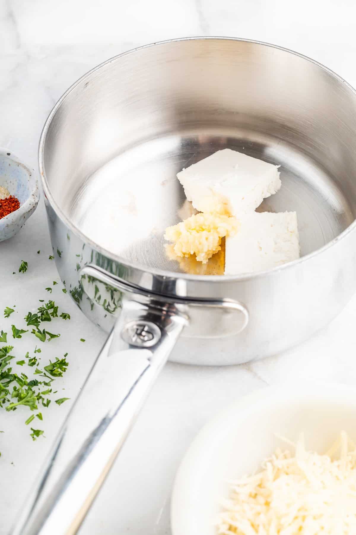 garlic and butter in a saucepan.