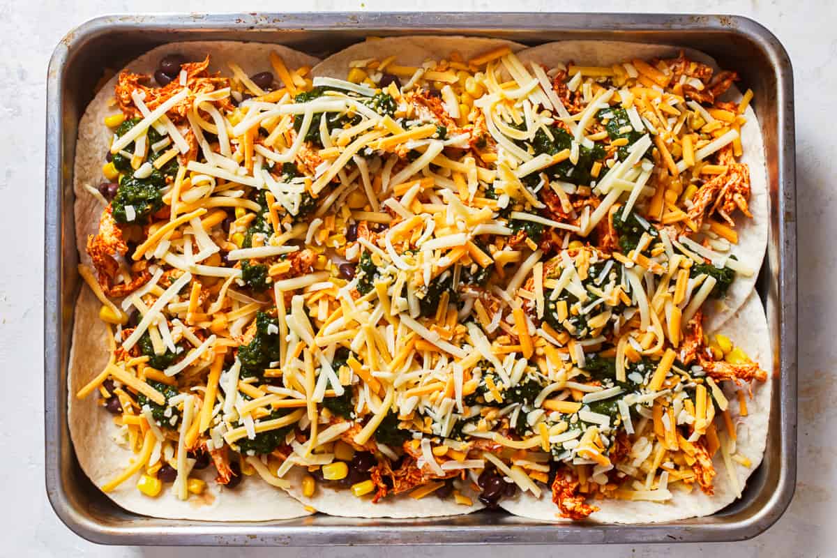 taco lasagna ingredients in a baking pan