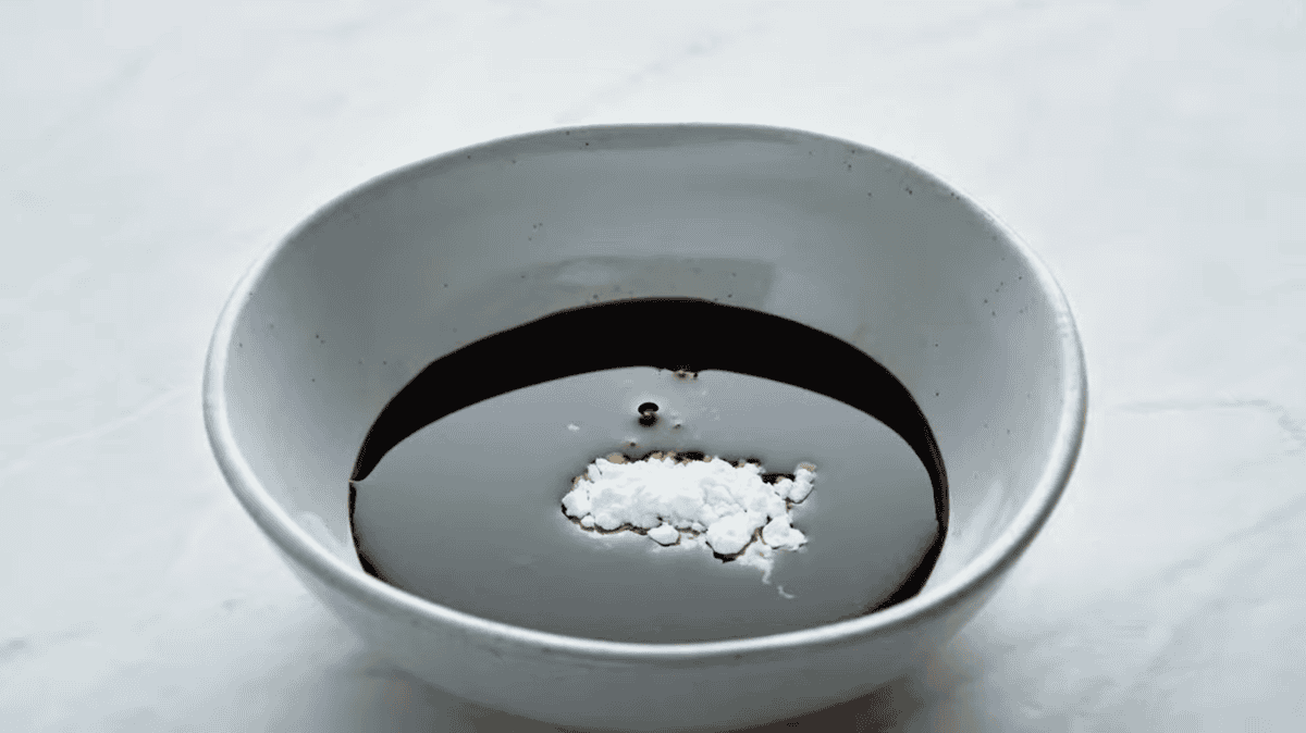 soy sauce with cornstarch in a small bowl.