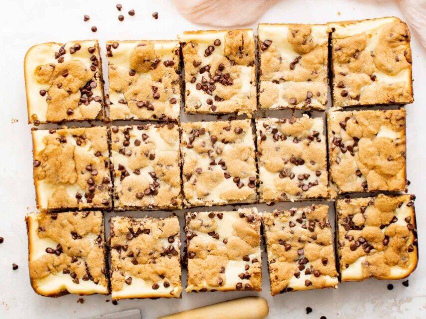 chocolate chip cheesecake bars cut into squares