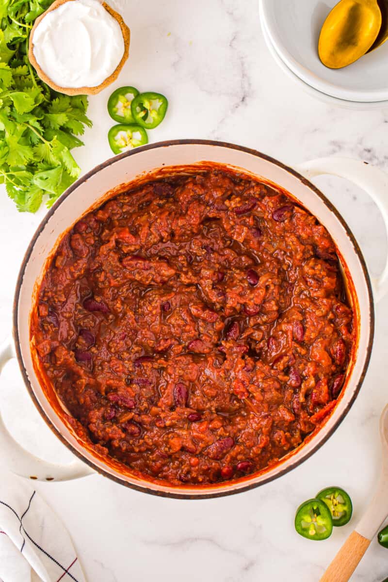 overhead view of chili con carne in a dutch oven.