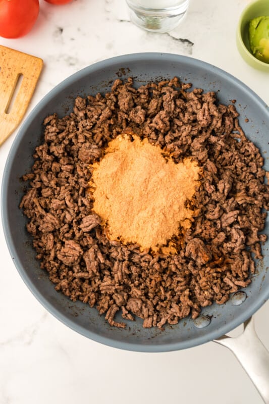 cooking ground beef in a skillet