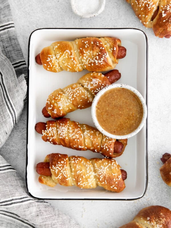 homemade pretzel dogs on a tray