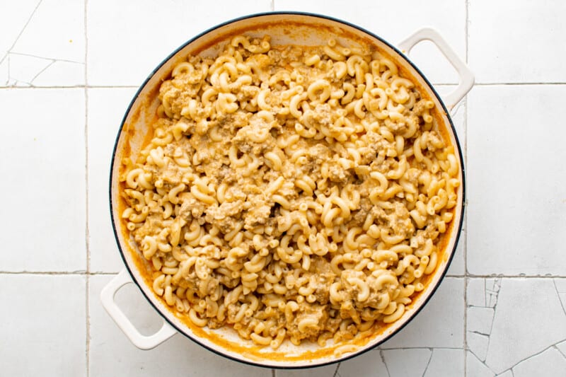 overhead view of hamburger helper in a white pan.