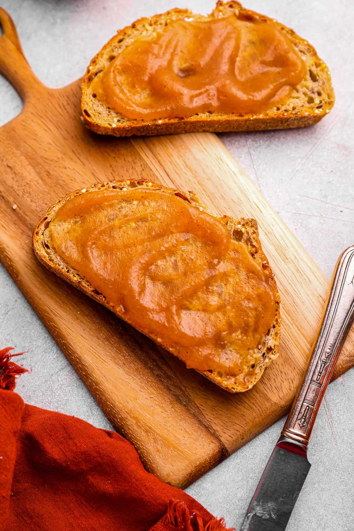 apple butter spread on two pieces of bread