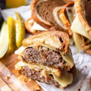 patty melt cut in half and stacked up