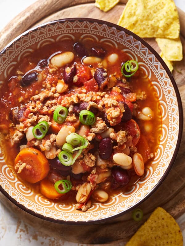 overhead view of instant pot turkey chili in a colorful patterned bowl.