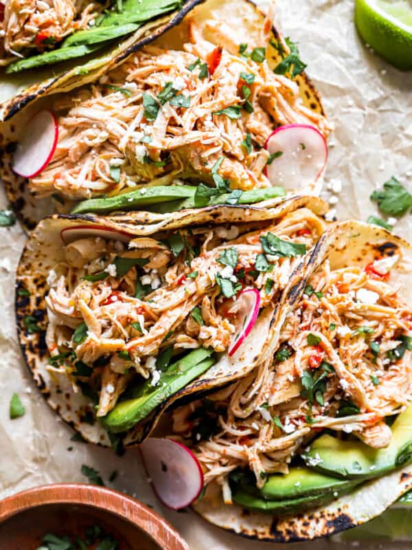 overhead view of 4 crockpot chicken tacos.