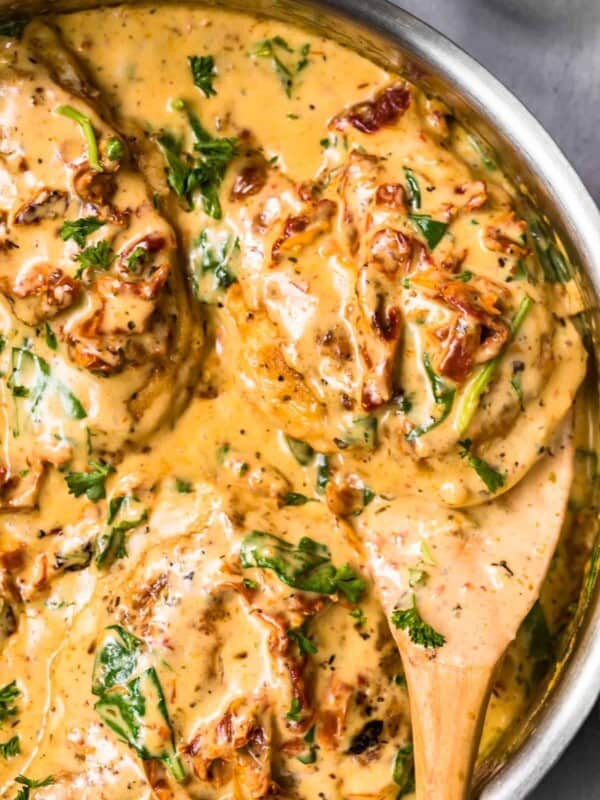 up close image of tuscan chicken in parmesan cream sauce