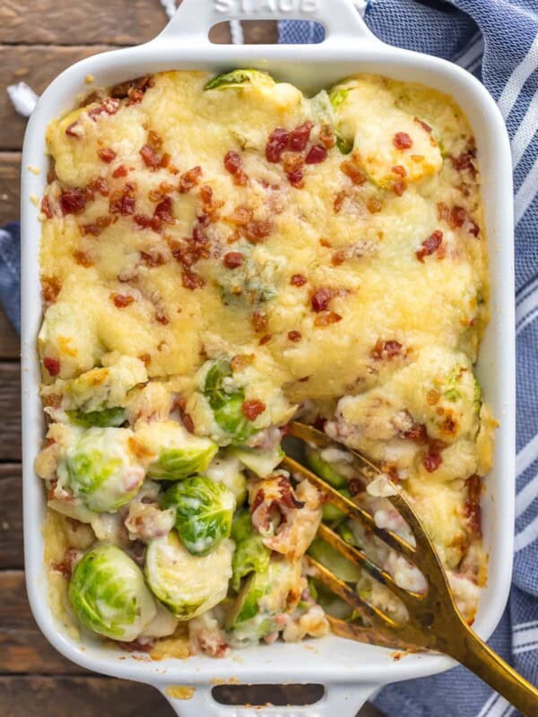 BRUSSELS SPROUT GRATIN with BACON is the ultimate holiday side dish! Who can resist brussels sprouts when sprinkled with bacon and SO MUCH CHEESE! The cream sauce inside is so easy and delicious, making this a Thanksgiving favorite for our family.