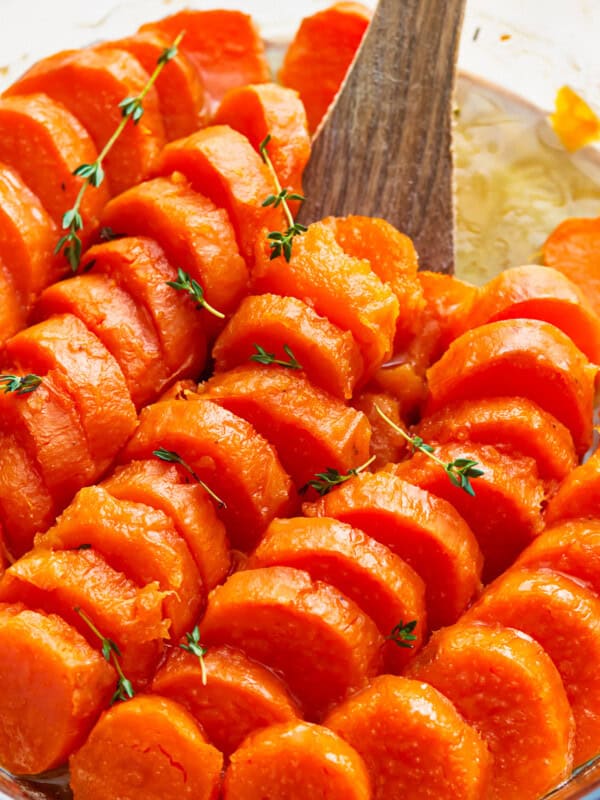 candied sweet potatoes in a glass dish.