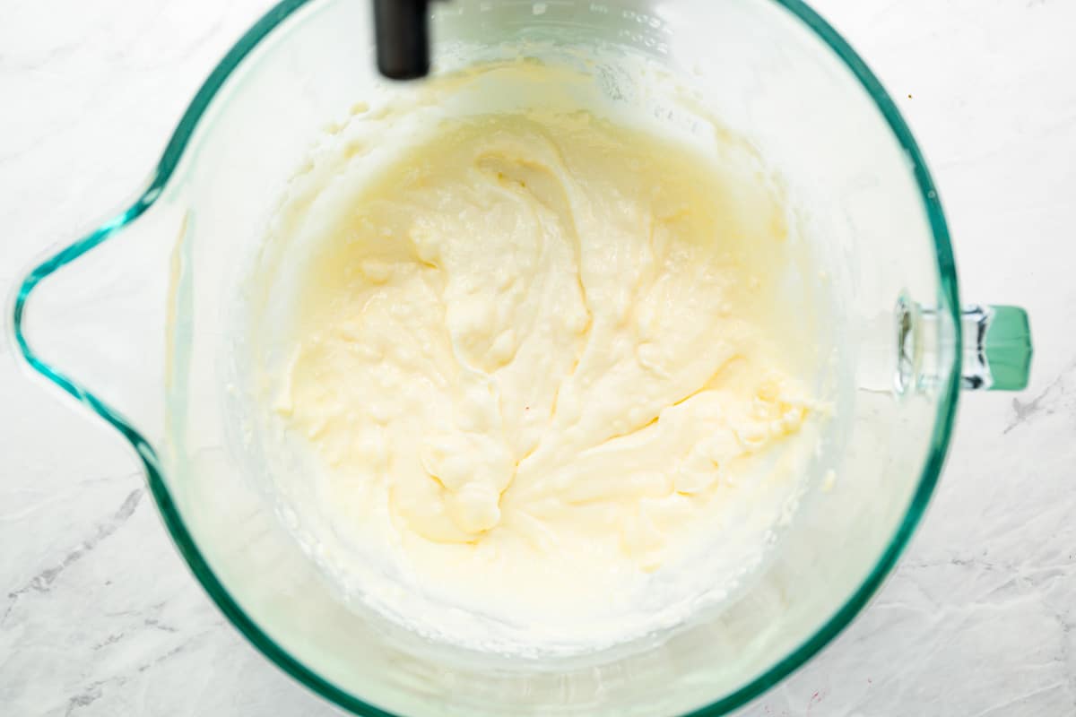 A bowl full of butter in a blender.