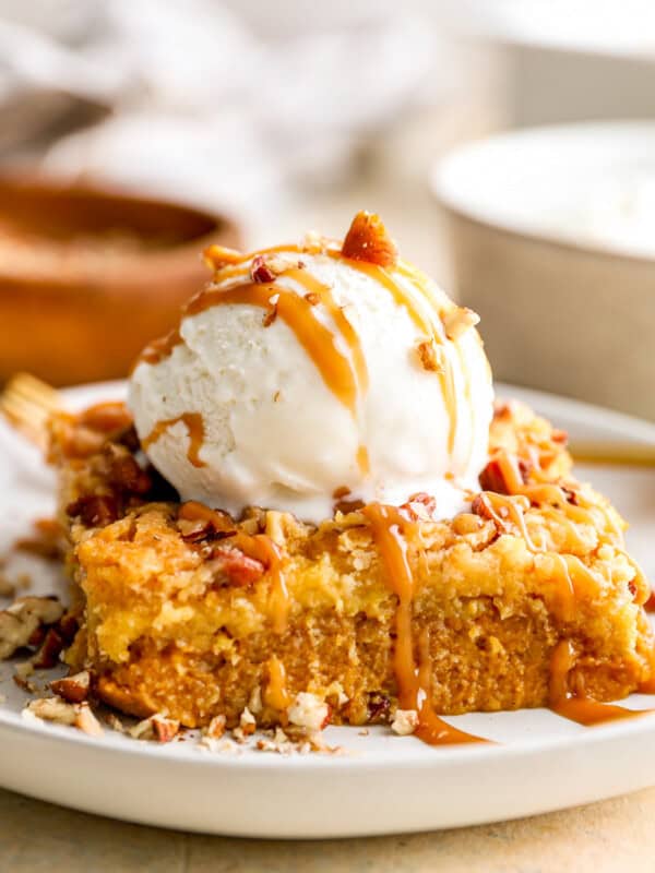 A plate topped with a piece of cake and ice cream.