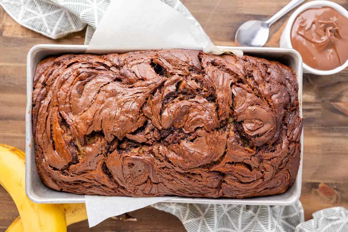 overhead view of nutella banana bread in a loaf pan.