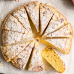 An almond cake dusted with powdered sugar.