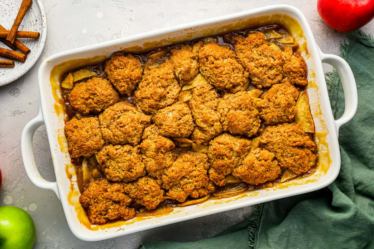 Baked apple cobbler in a baking dish.