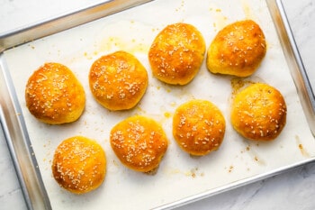 Cheeseburger bombs on a baking sheet.