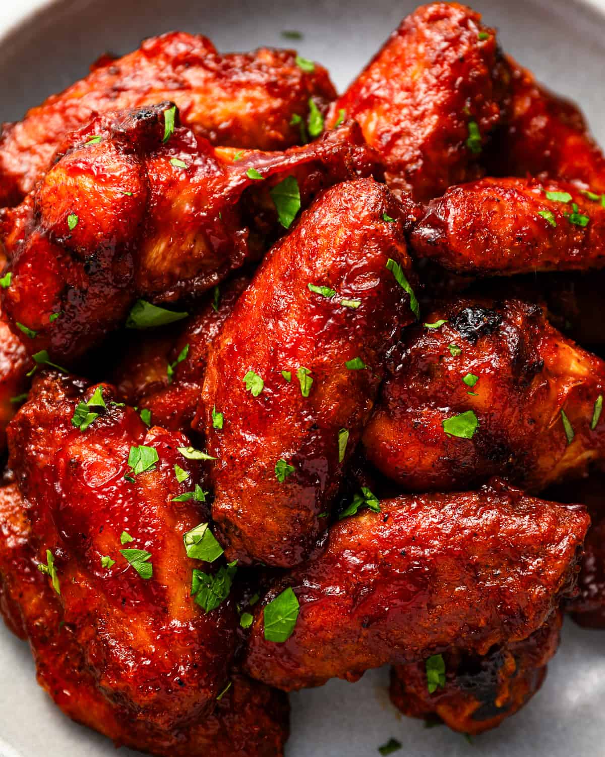 Delicious bbq chicken wings on a plate.