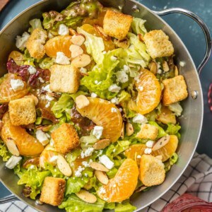 This MANDARIN ORANGE SALAD with ALMONDS AND CIDER VINAIGRETTE has been a favorite in our family forever! SO flavorful and easy. Such a great salad to throw together anytime!