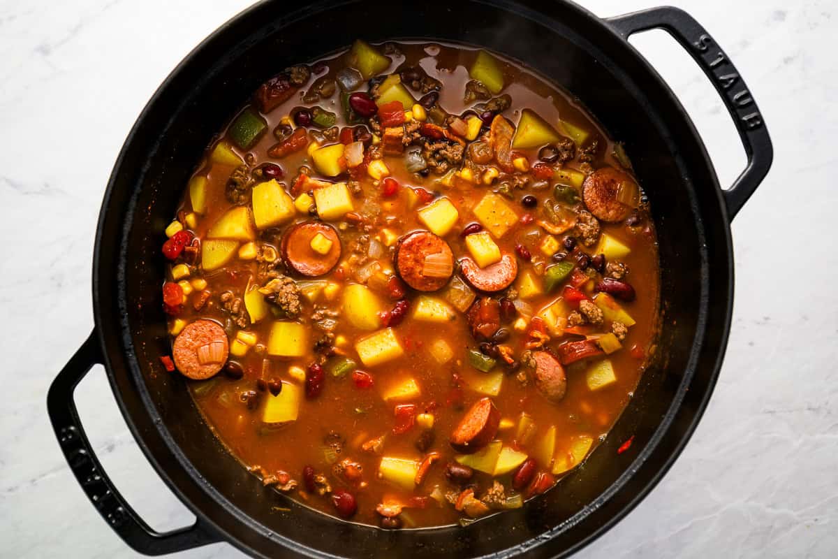 overhead view of cowboy stew in a dutch oven.