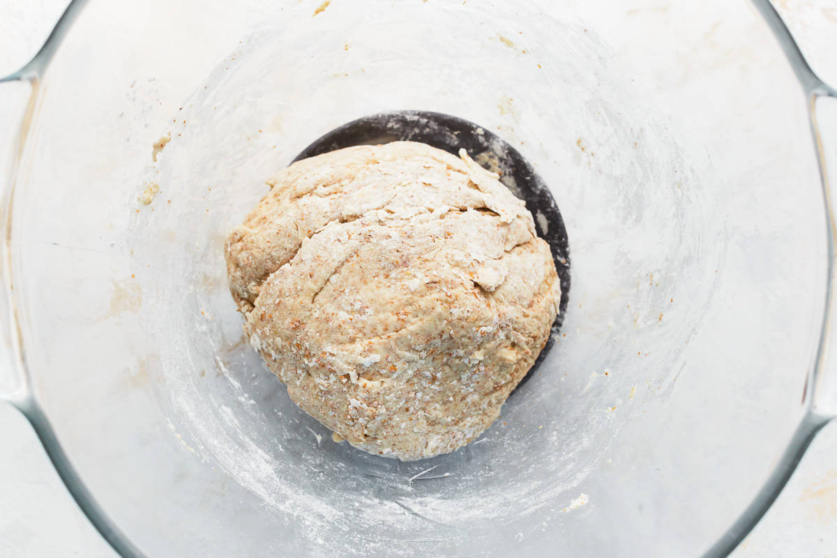 dough ball in a glass bowl.