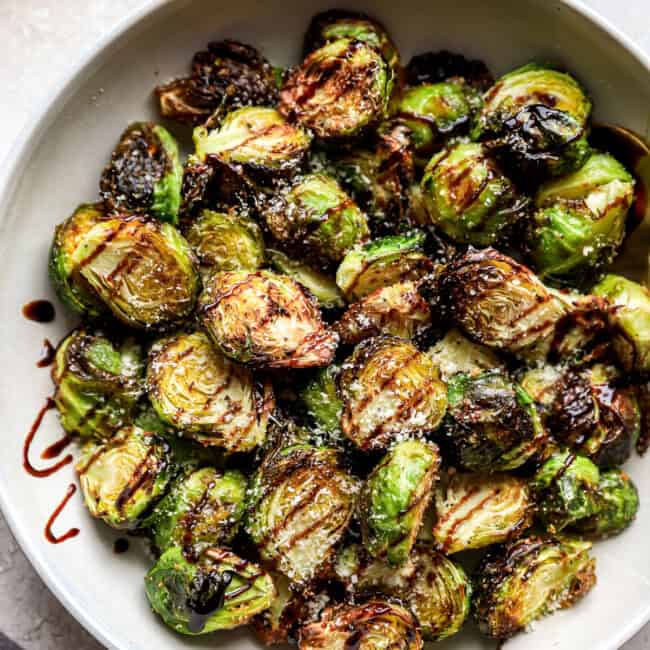 A bowl of air fried balsamic Brussels sprouts.