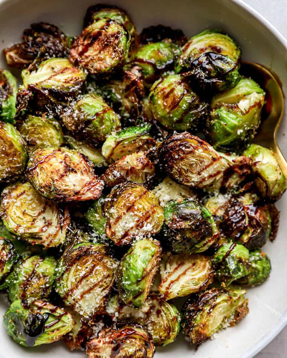 A bowl of air fried balsamic Brussels sprouts.