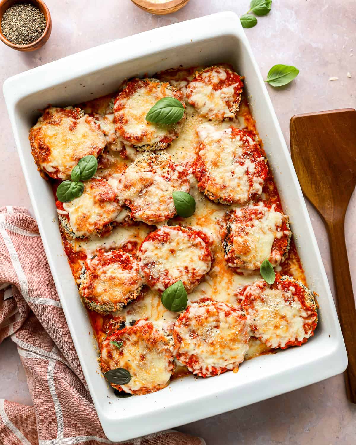 overhead view of eggplant parmesan in a baking pan.